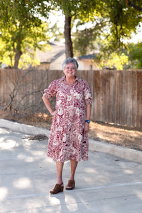 The Karla Abstract Print V-Neck Collared Tiered Dress with Puff Sleeves, & Smocked Cuffs