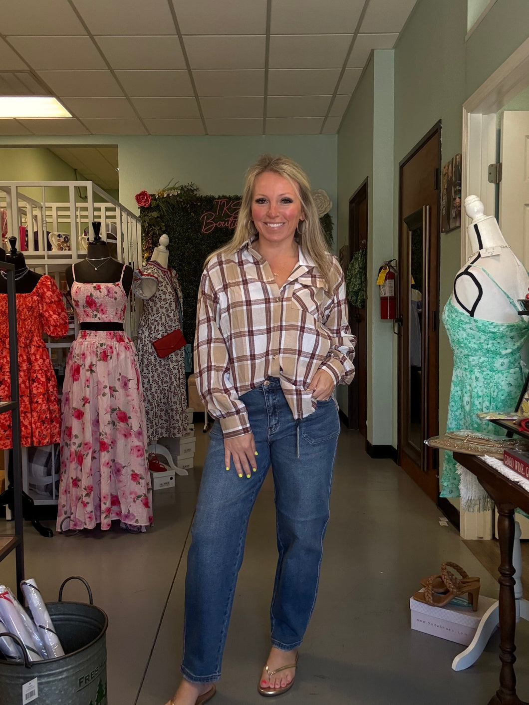 Plaid button down collared shirt