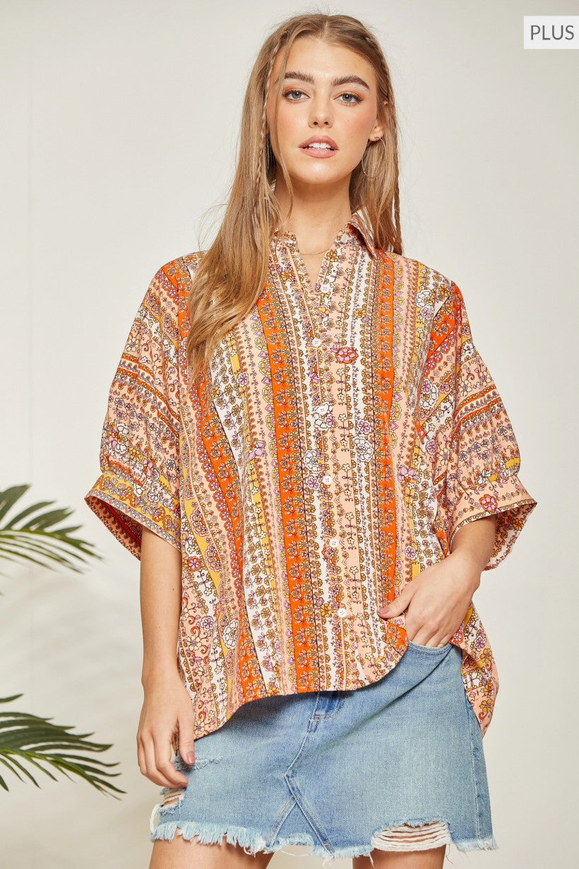 Striped top featuring floral print all over.