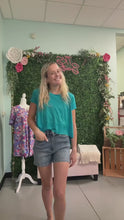 Load and play video in Gallery viewer, Shark bite side slit short sleeve top
