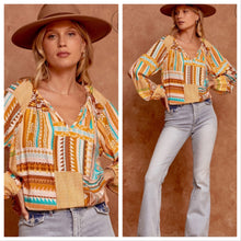 Load image into Gallery viewer, Printed top with split neckline and long sleeves
